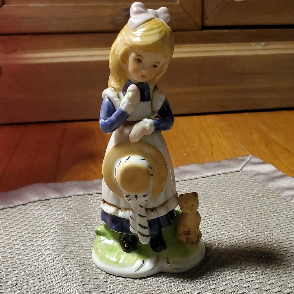 Charming Porcelain Girl Figurine with Cat